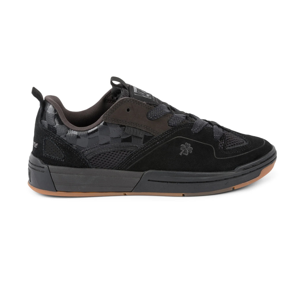 Profil des chaussures Vans x Dime Mixxa par Una Farrar noires