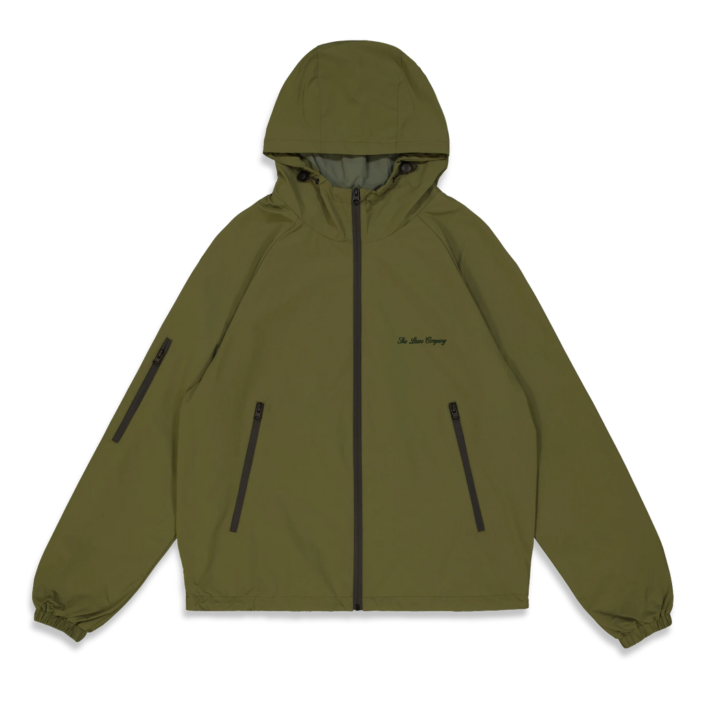 Veste The Loose Company Angel Shell Jacket Forest Green avec logo brodé et artwork Angel au dos – Yagö Skateshop Mons.