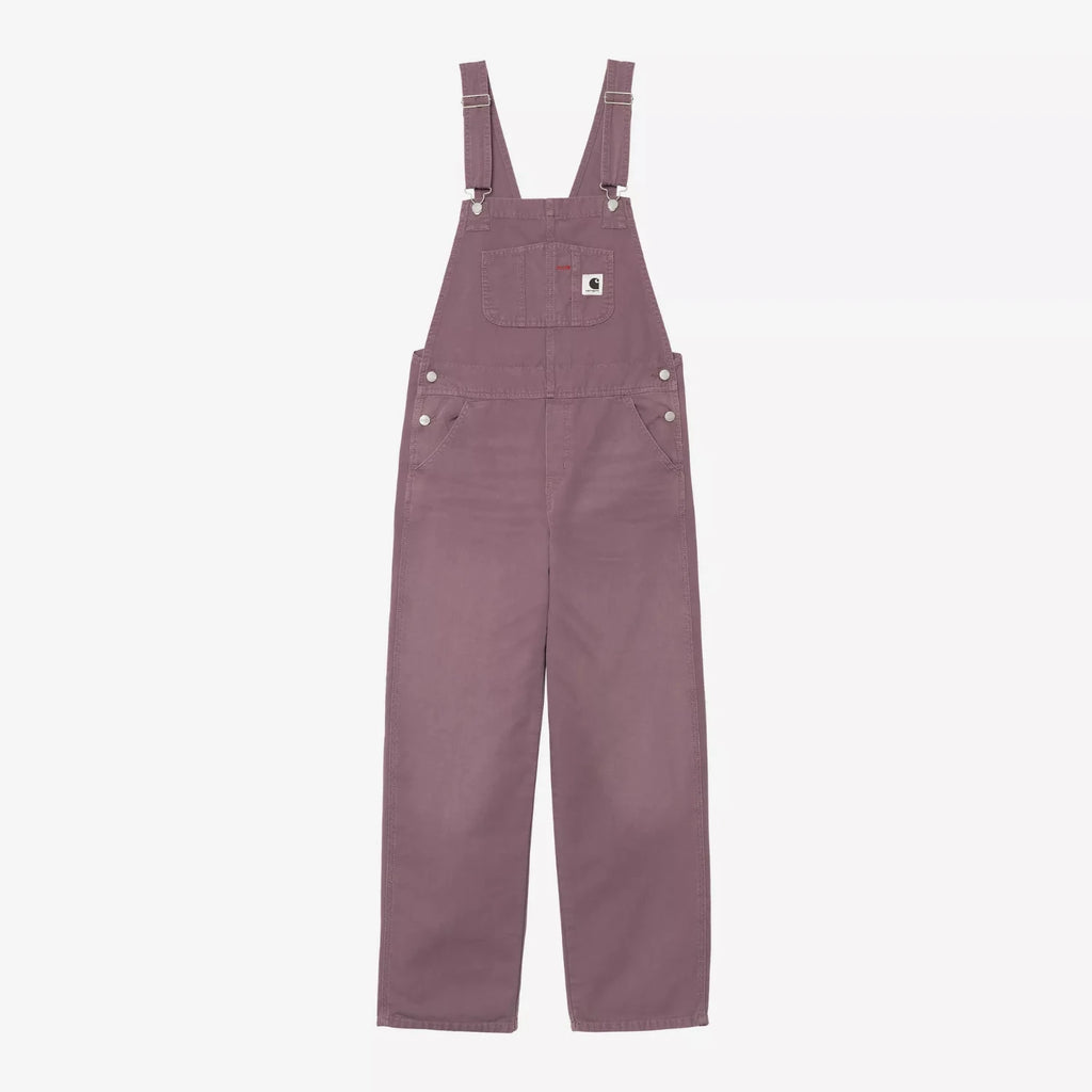 Salopette Carhartt WIP Bib Overall Straight femme en toile Hubbard 100 % coton 9 oz, coupe droite avec poches multiples et Square Label – dispo à Mons.