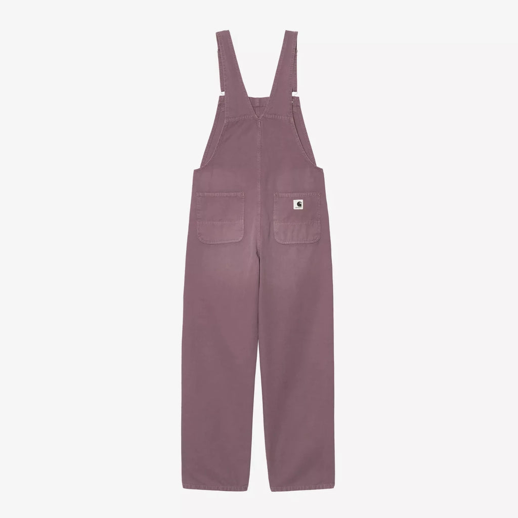 Salopette Carhartt WIP Bib Overall Straight femme en toile Hubbard 100 % coton 9 oz, coupe droite avec poches multiples et Square Label – dispo à Mons. Vu de dos